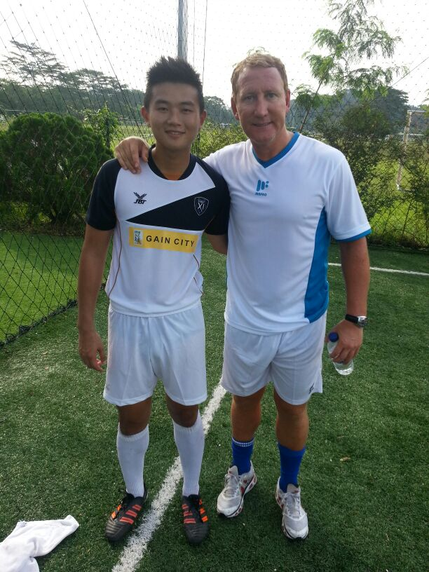 Gordon Toh rubs shoulders with Arsenal legend Ray Parlour during the filming of the First XI.