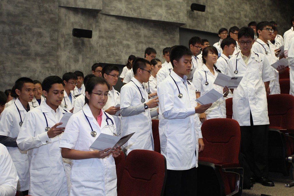PROFESSIONAL RITUAL: The first batch of medical students recited their oath.