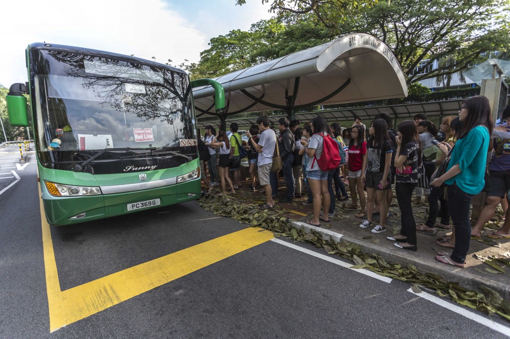 Long queues aplenty as students clamour to get to class under the new bus route system. | Photo: Felix Chew