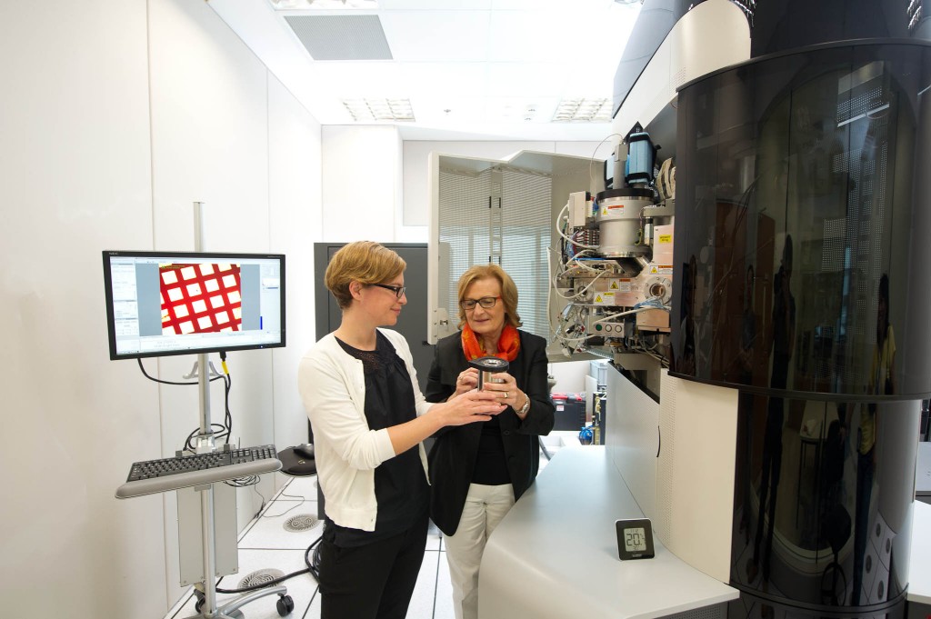 Asst. Prof. Sara Sandin (left) and Prof. Daniela Rhodes (right) working with the new Tecnai Artica Cryo-Electron Microscopy microscope at NTU. | Photo: NTU