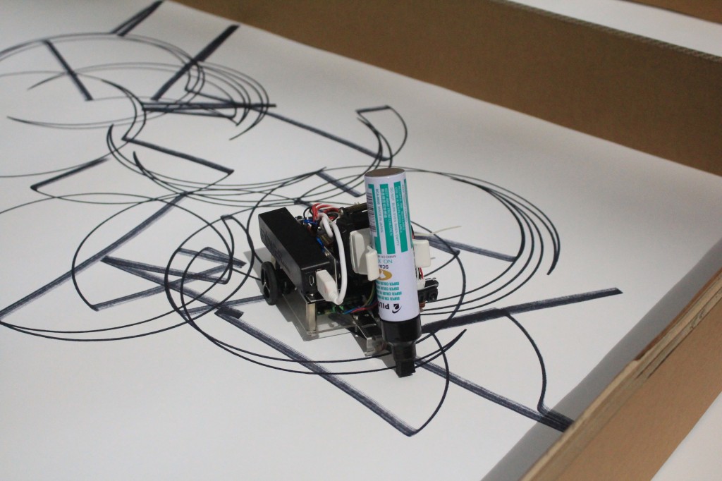 ART ATTACK: Robots are programmed by Mr Rohaimi to autonomously create graffiti art. PHOTO: NGO CHU TING