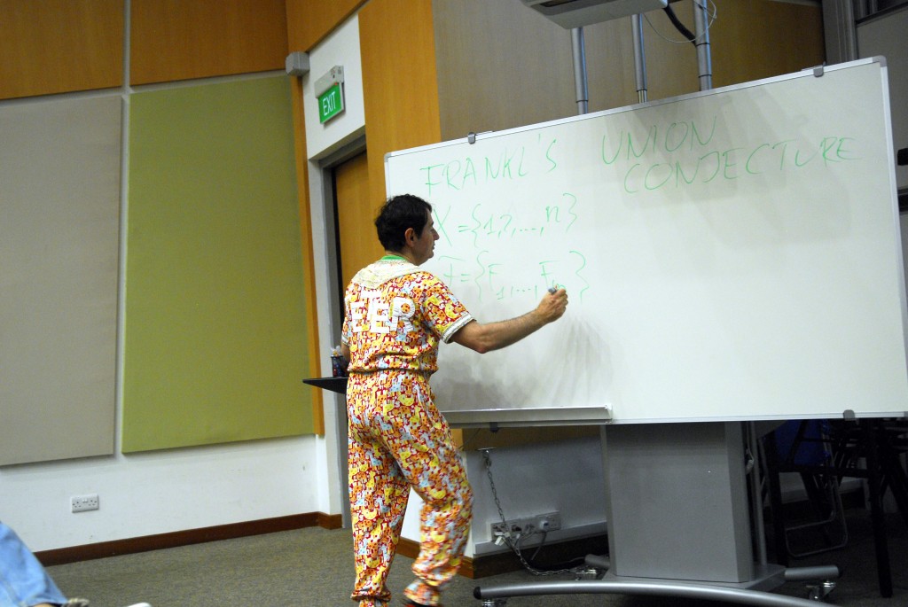 TAKING ON THE IMPOSSIBLE: Mr Frankl challenges the audience to solve his famous mathematical problem. PHOTO: VIMALA D/O GANAVALU