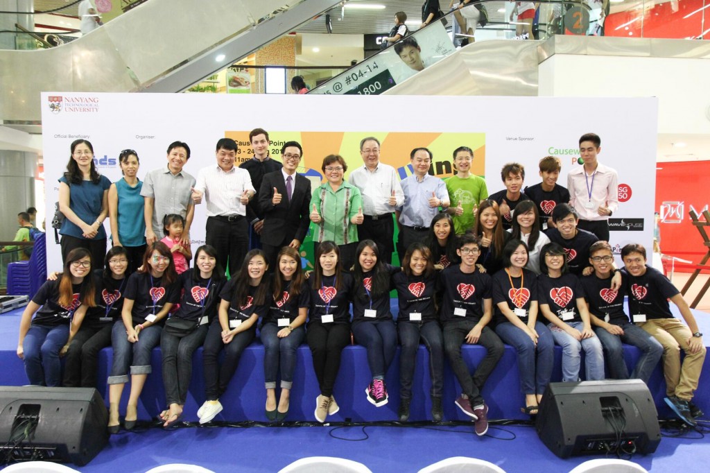 TEAM EFFORT: The event organising committee poses for a photograph with guest of honour Ms Ellen Lee.