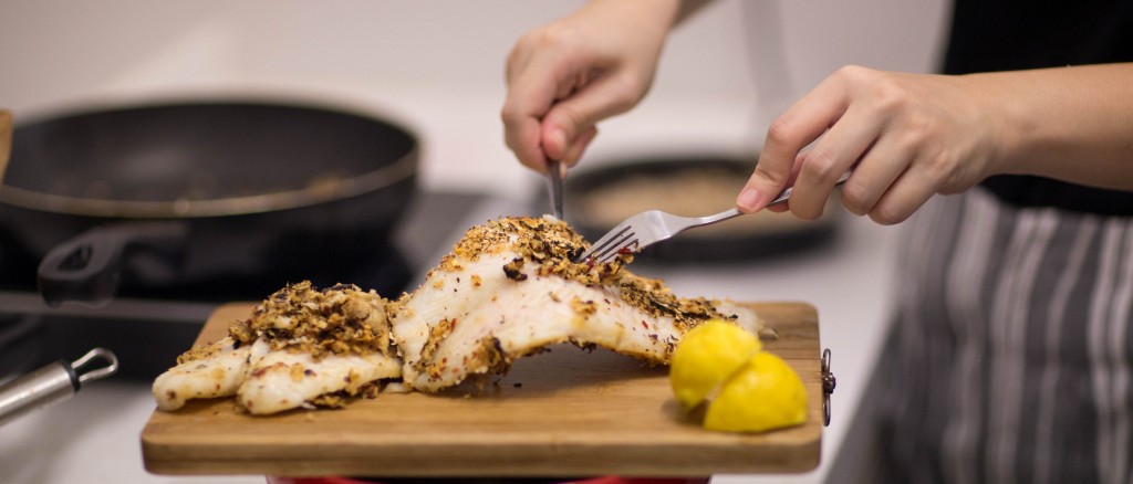 FISHY BUSINESS: Plating the Oats and Peri Peri Spice Crusted Fish. (PHOTOS: MATTHEW CHEW)