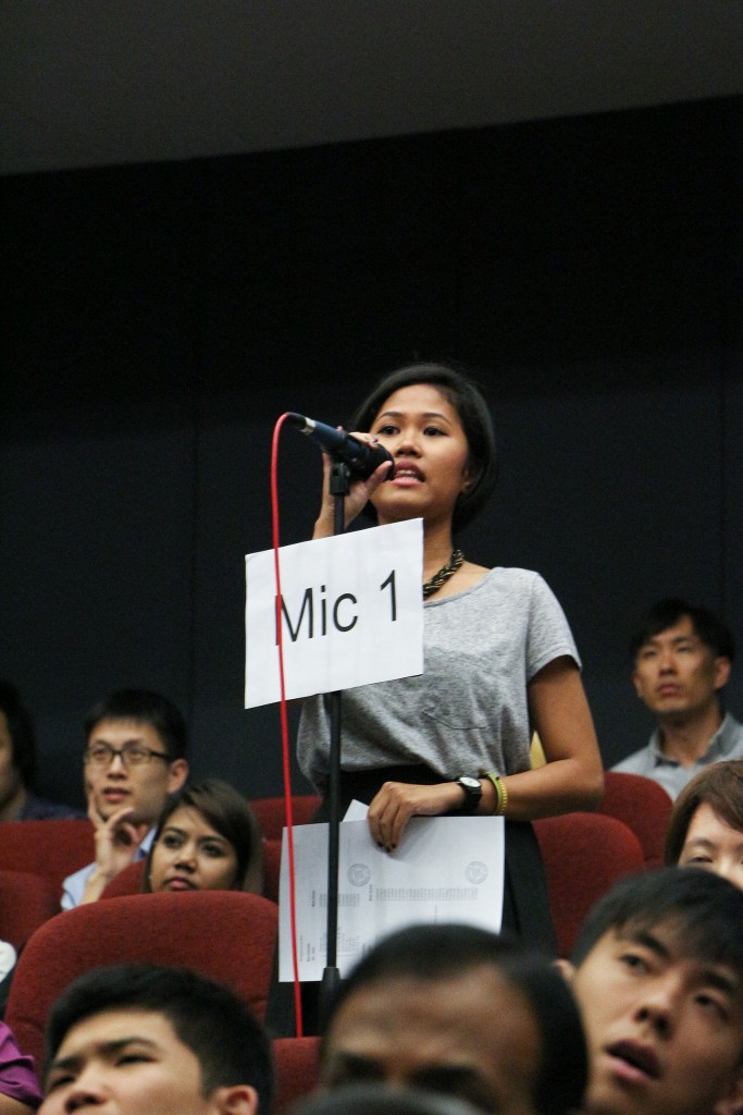 RAISING BIRTH RATES: Firqin Sumartono, 23, posed a query about the government's plans in bringing up the birth rates. PHOTO: KRISTAL TAI