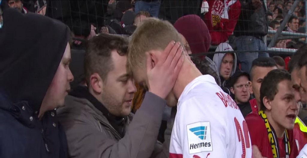 TOO CLOSE FOR COMFORT: 18-year-old VfB Stuttgart defender Timo Baumgartl comforted by a fan after losing 1-0 to Borussia Dortmund. PHOTO: Internet