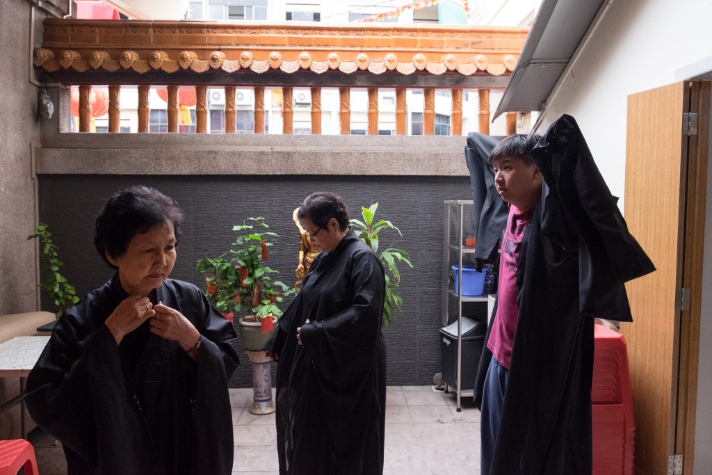 Chong often resented having to help out at the temple when he was younger, but now he joins in prayer sessions whenever a devotee is absent. PHOTO: KENJI KWOK