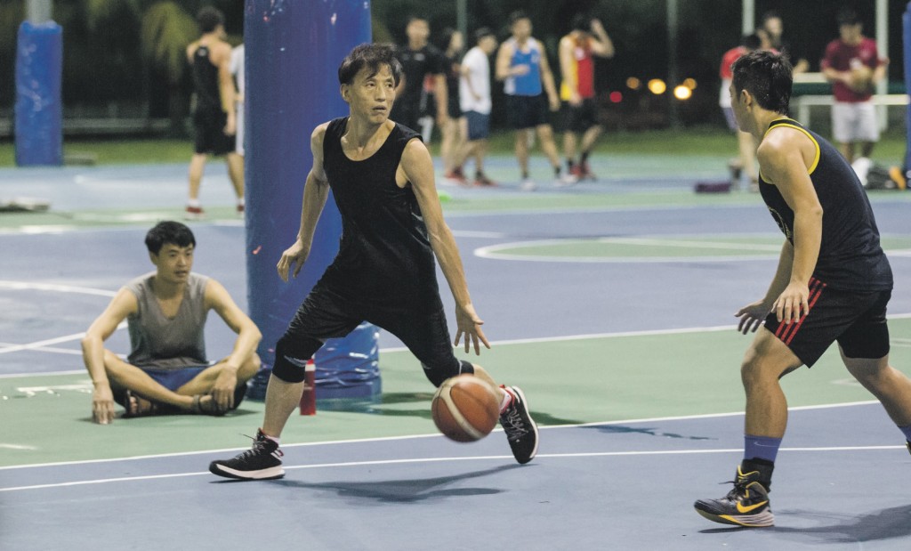 A familiar face at the Sports and Recreation Centre, Assoc Prof Wu Yuan has been playing basketball every night since he joined NTU in 1994. PHOTO: NICHOLAS YEO