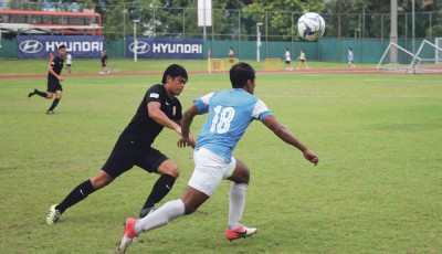 Hall 16 defender Ong Kang Sheng (left) has felt a difference in the pitch size and atmosphere at the Jalan Besar Stadium. PHOTO: FIONA MEI ROBINSON