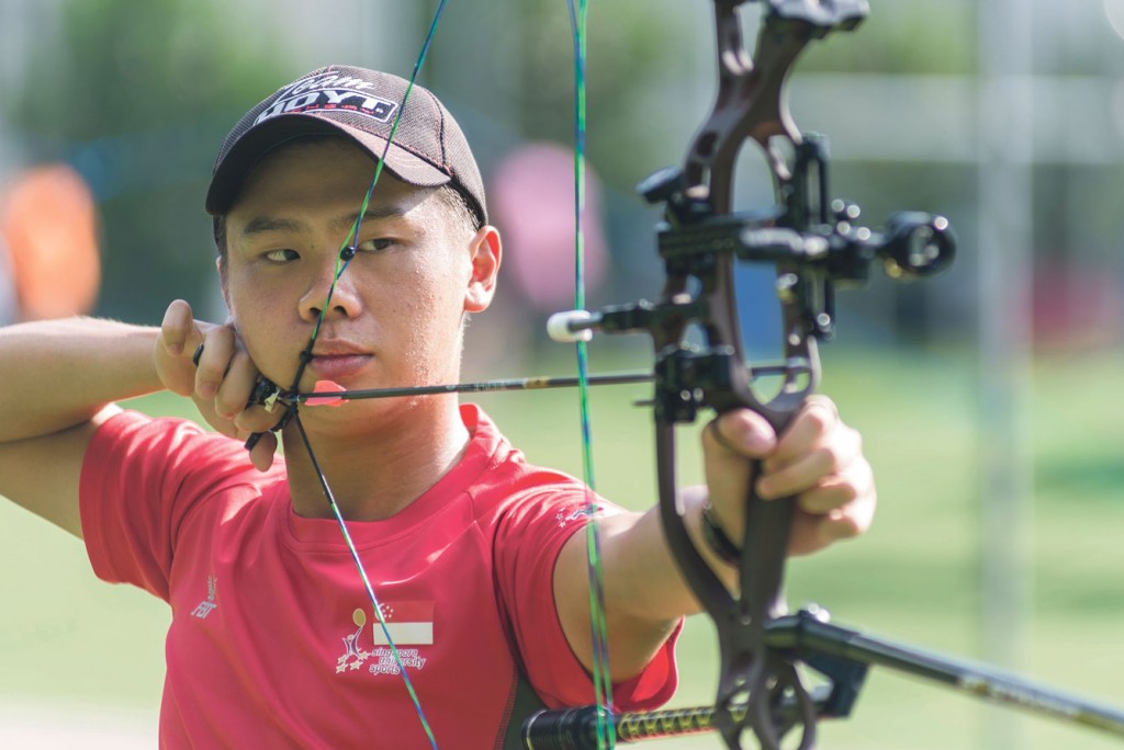 A wrist injury did not stop archer Ang Han Teng  from winning two bronze medals at the ASEAN University Games in July. PHOTO: ZHENG JUNCEN
