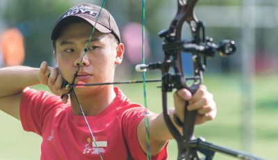 A wrist injury did not stop archer Ang Han Teng from winning two bronze medals at the ASEAN University Games in July. PHOTO: ZHENG JUNCEN
