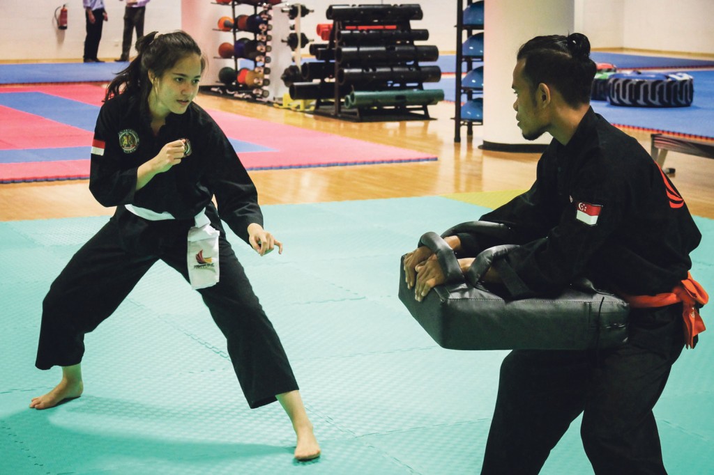 Nurul Shafiqah (left) is spoiling for a fight at the Asian Beach Games in Vietnam, on her return from injury. PHOTOS: FIONA MEI ROBINSON