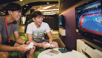 NTU students Xavier Chua (left) and Melvin Tan (right) play console games at the Student Activities Centre. PHOTOS: ZHENG JUNCEN