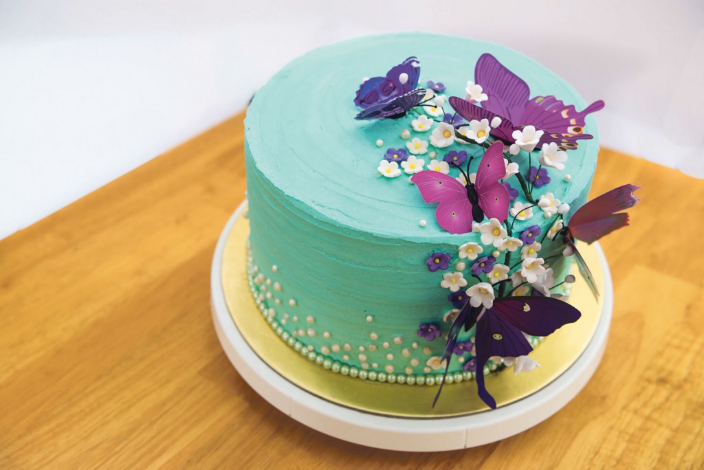 Dark chocolate and vanilla sponge cake with cream cheese frosting by Fina Jahan. PHOTOS: ZHENG JUNCEN, VALERIE LAY, LEE SU FANG, SOPHIE NG, ONG YONG JIA