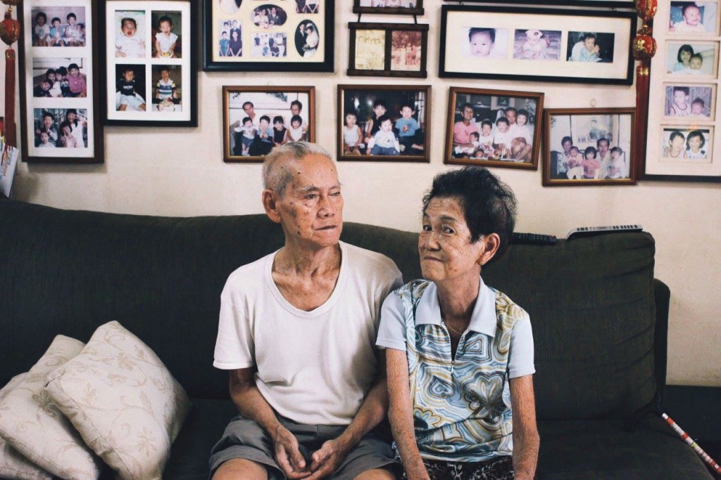 The home of Mr Leong and Mdm Tham Yoke Seow, 71, is plastered with family pictures. The couple have four children and five grandchildren. Every year, they take at least 2 family photos — one during Chinese New Year, and another during the birthday celebration for both Mr Leong and Mdm Tham, whose birthdays are only a day apart.