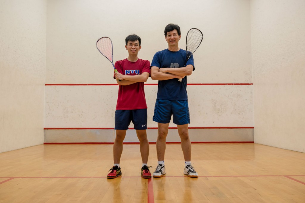 NTU squash player Austin Ong (pictured in red) still receives training from his father, Mr Vincent Ong, despite having a number of school coaches. PHOTOS: ZHENG JUNCEN