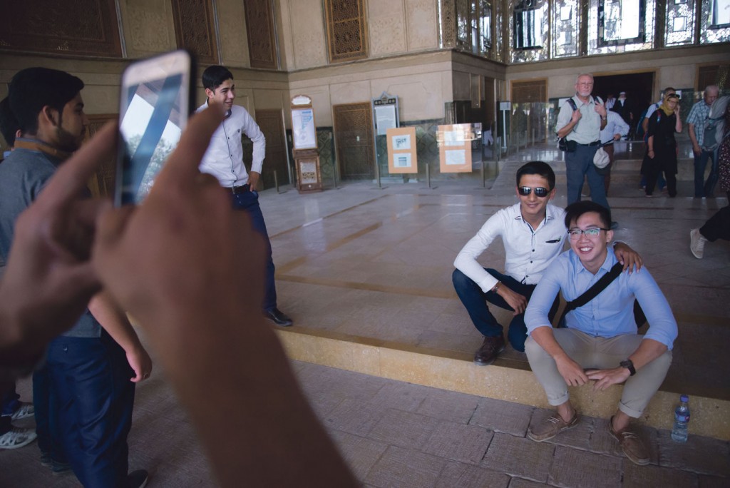 TOURIST CHARM: Several Iranian men requested to take pictures with me while I was taking a break in Isfahan’s Chehel Sotoun pavilion. 