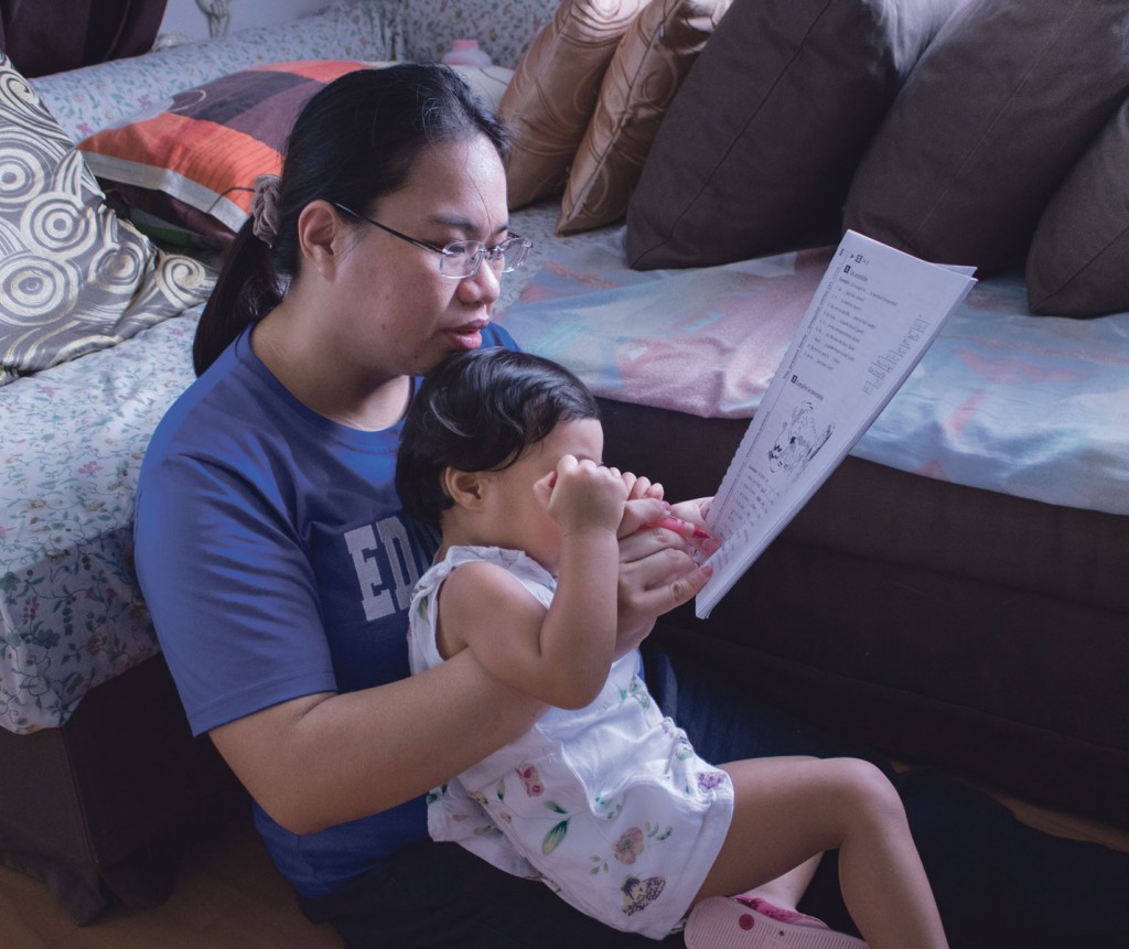 Madam Lai gives tuition during the weekend to earn additional income. She often has less time to play with Amberly when project and work deadlines draw near. 