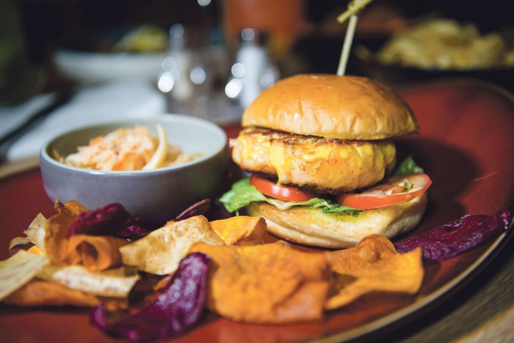 Juicy prawn burger with salted egg yolk sauce. PHOTO: ZHENG JUNCEN