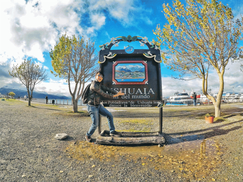 Owen at the “End of the World” sign in the  southernmost city of the world, Ushuaia, Argentina